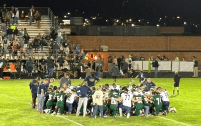 LIONS SHOW GRIT IN ROAD WIN OVER WOODLAND PARK